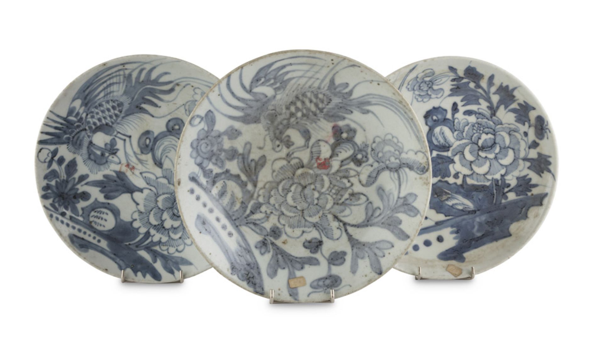 THREE BLUE AND WHITE PORCELAIN DISHES, CHINA EARLY 20TH CENTURY decorated with peonies, rocks and