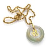 CHOKER in yellow gold 18 kts., with twisted chain and circle jade pendant. Length chain cm. 46,