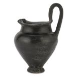 OINOCHOE IN BUCCHERO, SOUTHERN CENTRAL ETRURIA 6TH-5TH CENTURY B.C. black polished, conical bun foot