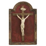 CRUCIFIX IN IVORY, 18TH CENTURY with carved Christ. Wooden cross on support and giltwood frame.