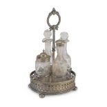 CRUET IN SILVERPLATED, UNITED KINGDOM EARLY 20TH CENTURY with bottles in cut glass. Measures cm.