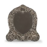 TABLE MIRROR IN SILVER, PUNCH LONDON 1891 embossed with floral motifs and coat of arms of family.