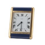 TABLE ALARM CLOCK CARTIER, '50s case in brass and enamelled metal. Quartz movement, botton with hard