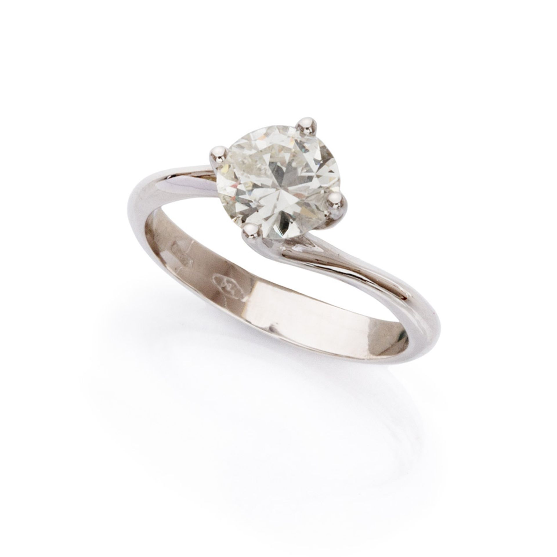SOLITAIRE RING in white gold 18 kts., with central diamond. Diamond ct. 1.10 ca., color HI,