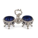 DOUBLE SALTCELLAR IN SILVER, PUNCH PARIS LATE 19TH CENTURY with pearly edges and basin chiseled with