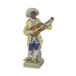 PORCELAIN SCULPTURE, MEISSEN EARLY 20TH CENTURY in polychromy, representing a masked musician.