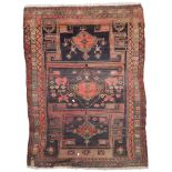 CAUCASIAN KARABAGH CARPET, EARLY 20TH CENTURY triple abstract medallion within rectangular