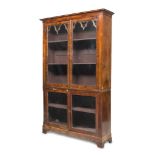 NEOGOTHIC BOOKCASE IN WALNUT, FIRST HALF OF 19TH CENTURY in two parts, upper part with two glass