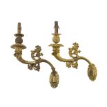 A PAIR OF APPLIQUES ARMS IN ORMOLU, EARLY 19TH CENTURY shaped to leafy cornucopias. Measures cm.