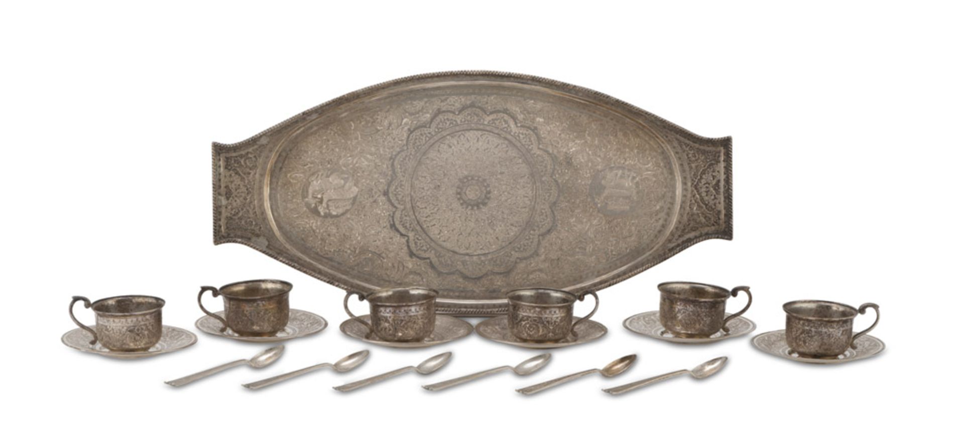 TEA SERVICE IN SILVER, MIDDLE EAST, EARLY 20TH CENTURY Consisting of six cups with saucers, six
