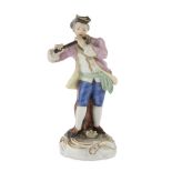 PORCELAIN FIGURE, VIENNA LATE 19TH CENTURY in polychromy, representing figure of piper. Blue mark