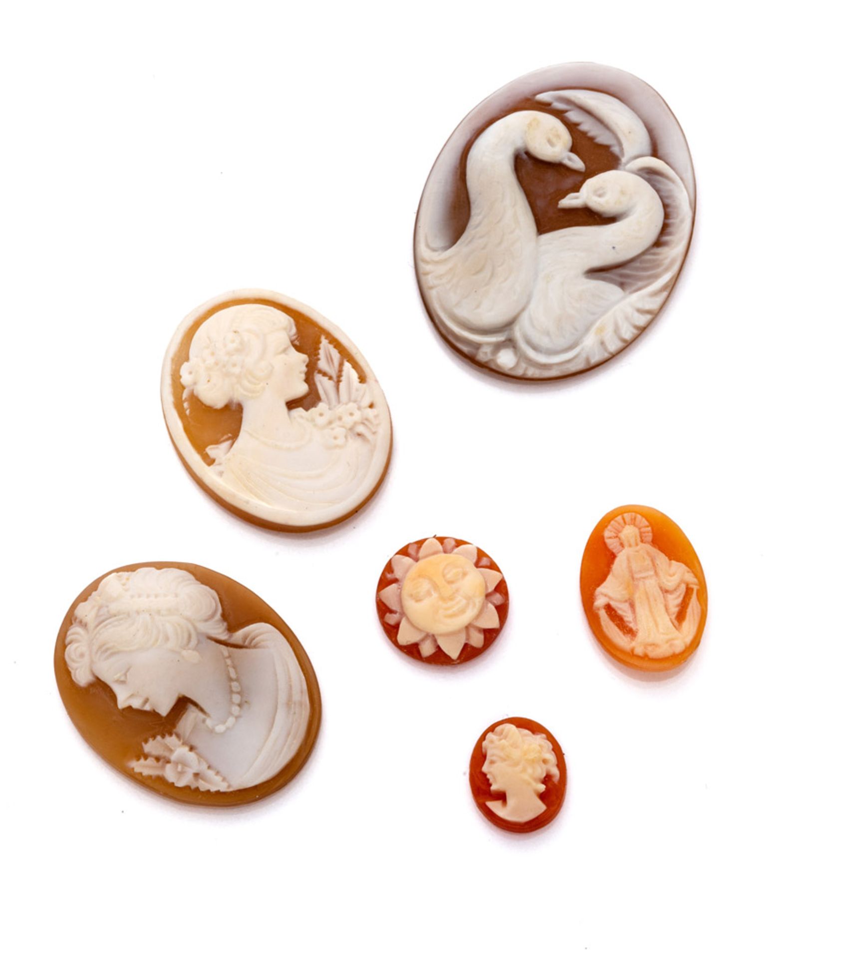 SIX SMALL CAMEOS carved to profiles, devotional elements and animals. Maximum size cm. 4 x 3. SEI