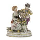 PORCELAIN GROUP, MEISSEN LATE 19TH CENTURY in polychromy, representing two little boys with cage and