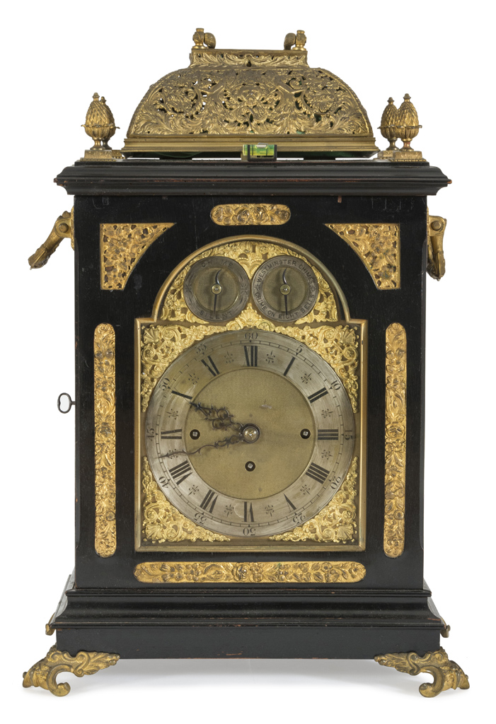 RARE TABLE CLOCK, ENGLAND ELEGANT 18TH CENTURY case in ebonized wood and finishes, hat and feet in