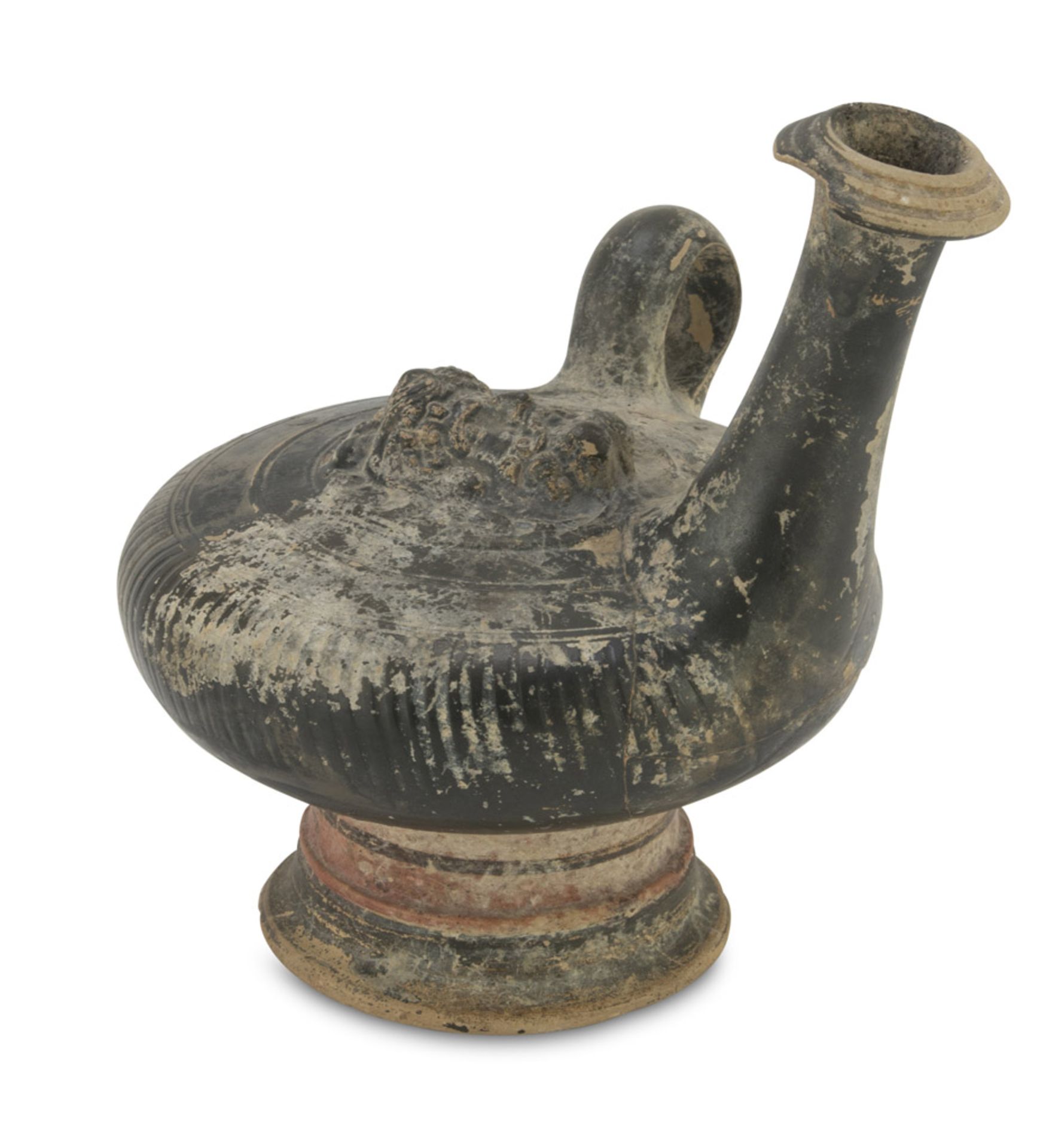 BLACK VARNISHED APULIAN GUTTUS, 4TH CENTURY B.C. in yellowish clay, black varnish, band on the