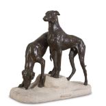 EUROPEAN SCULPTOR, EARLY 20TH CENTURY TWO GREYHOUNDS A bronze group with burnished patina, cm. 65