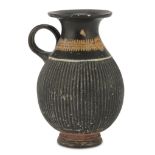 SMALL CLAY PITCHER, 2ND CENTURY B.C. overpainted black varnish. Cylindrical neck, globular body, low