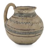 SMALL PITCHER, DAUNIA 6TH-5TH CENTURY B.C. decorated with dichromate geometric motifs. h. cm. 15.