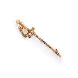 BROOCH in yellow gold 14 kts., shaped to sword embellished by diamonds rose cut. Diamonds ct. 0.