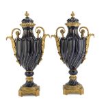 SPLENDID PAIR OF PORCELAIN VASES, SEVRES, EARLY 19TH CENTURY cobalt and gold enamelled. Finishes and