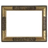 GILDED AND LACQUERED WOOD FRAME, 17TH CENTURY engraved with leaf motifs and decorated with faux