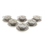 SIX CUPS IN PORCELAIN AND SILVER, PUNCH BIRMINGHAM 1912 with saucers and decorated with floral