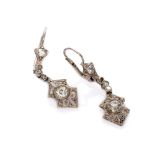 ELEGANT PAIR OF TREMBLANT EARRINGS in white gold 18 kts., with two antique cut diamonds on pierced