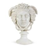 SPLENDID HEAD OF MEDUSA IN WHITE STATUARY MARBLE, 19TH CENTURY with round plinth foot. Measures