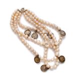 NECKLACE of three pearl threads with pending steel coins. Length cm. 42. COLLANA a tre file di perle