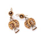 ATTRACTIVE EARRINGS in yellow gold 14 kts., with pendants shaped to horseshoe and stirrup. Length