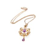 CHOKER in yellow gold 14 kts., with central amethyst edged by bows embellished by small pearls and