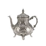 SILVER TEAPOT, PUCH VIENNA POST 1867 Handles with separators in bone, four feet. Silversmith 'N.A.'