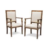 A PAIR OF ARMCHAIRS IN WALNUT, EARLY 19TH CENTURY with rectangular back and herma uprights with