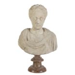 BUST OF EMPEROR COMMODO IN WHITE STATUARY MARBLE, 16TH CENTURY leaning on molded round base in