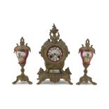 SMALL FIREPLACE TRIPTYCH, LATE 19TH CENTURY in gilded metal with placques in porcelain decorated