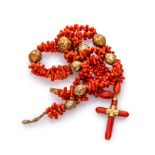NECKLACE in red coral alternated by spheres in gold 14 kts. with pendant cross finished in gold.