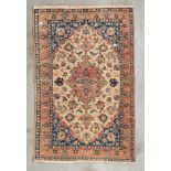 KASHAN CARPET, MID-20TH CENTURY pink medallion and secondary motifs of branches with palmette,