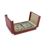 CARD BOX, CARTIER 20TH CENTURY in red leather engraved in gold. Complete of cards. Mark inside.