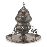 SILVER CENSER, 18TH CENTURY chiseled to leaf motifs with double ramages feet, on plate. Measures cm.