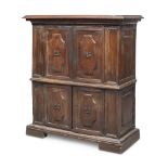 RARE SMALL WALNUT CABINET, CENTRAL ITALY LATE 17TH CENTURY with two superior doors and two