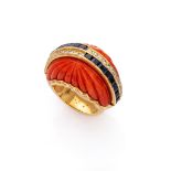 SPLENDID RING in yellow gold 18 kts., with red coral and central line of sapphires and diamonds.