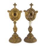 A PAIR OF OSTENSORIES IN GILTWOOD, MARCHE 18TH CENTURY complete of relics and sculpted to motifs