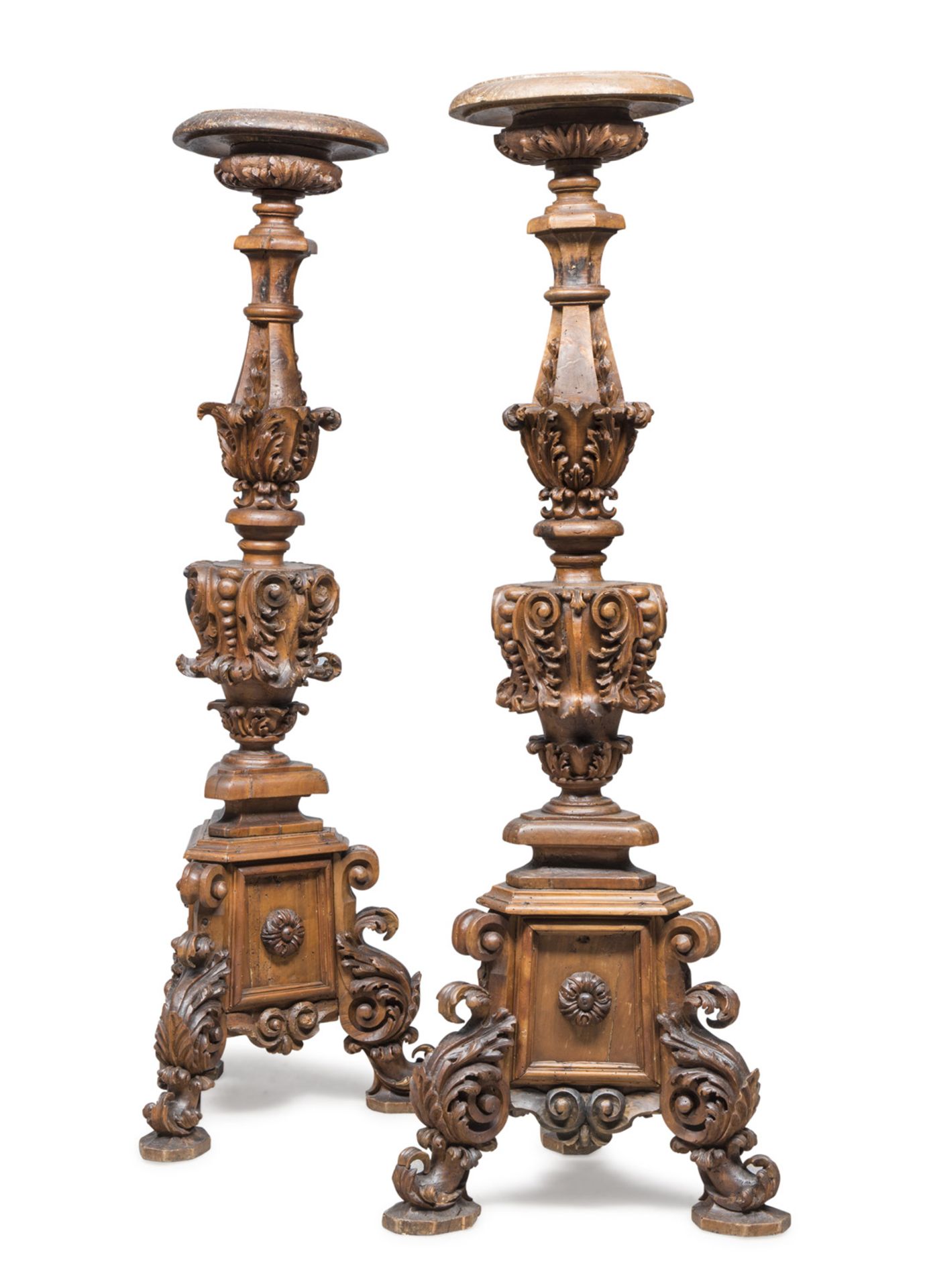 SPLENDID RARE PAIR OF FLOOR CANDLESTICKS, ROME 17TH CENTURY entirely sculpted to scrolls, acanthus