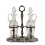 CRUET IN SILVER, PUNCH ALEXANDRIA 1934/1944 with herma uprights. Bottles in cut glass. Silversmith