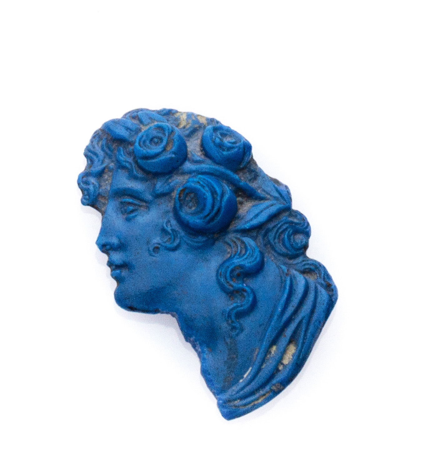 RARE BAS-RELIEF in antique azzurrite of woman's profile with roses in the hair. Measures cm. 3 x 18.