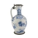 MAIOLICA JUG, HOLLAND LATE 18TH, EARLY 19TH CENTURY in white and blue enamel, decorated with Chinese