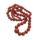 BEAUTIFUL NECKLACE in red coral with scaled spherical elements. Length cm. 76, total weight gr. 84,