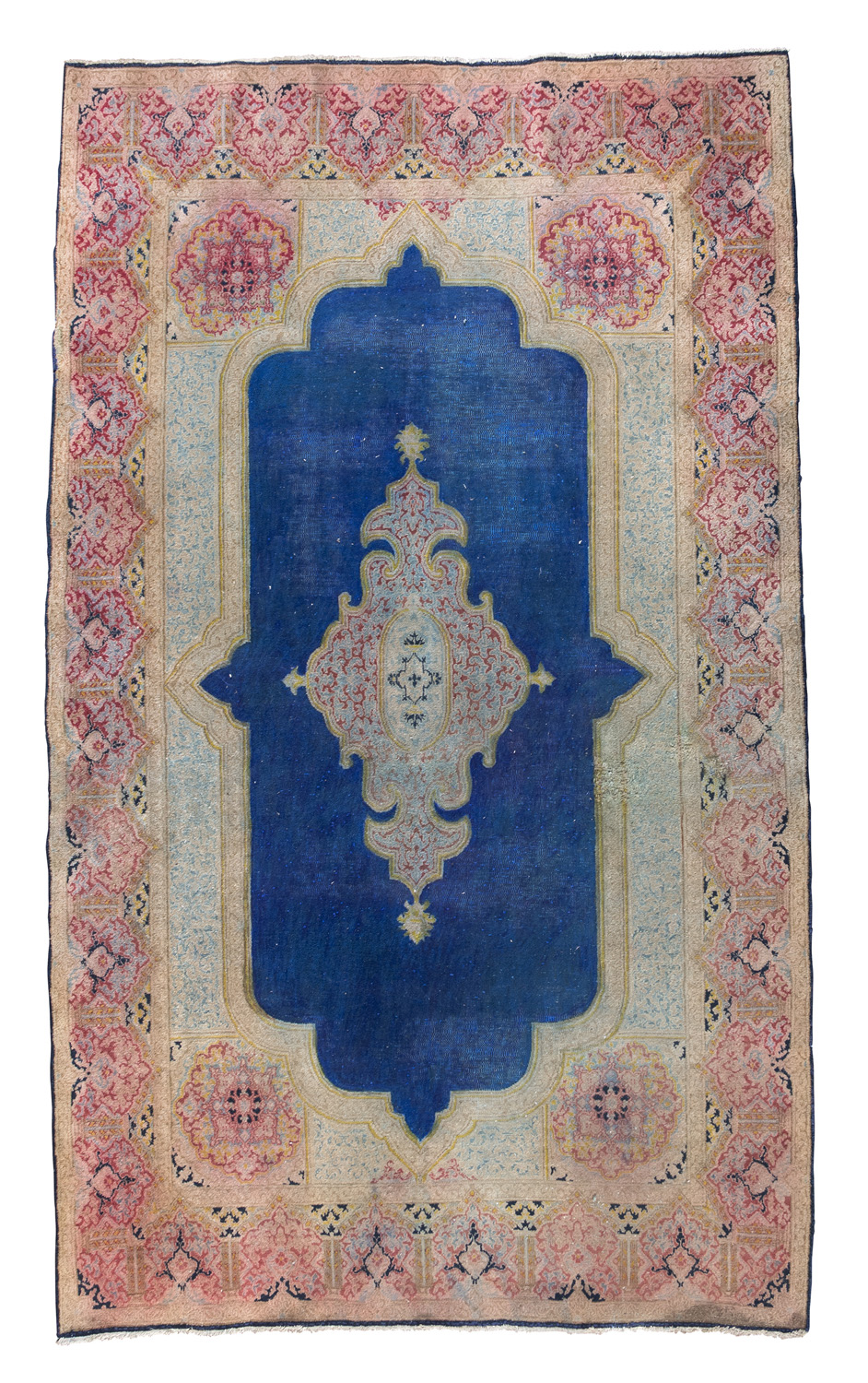 Rare Carpet KIRMAN, EARLY 20TH CENTURY with medallion arabescato, in the center field on blue