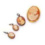 FOUR PENDANTS WITH CAMEOS in yellow gold 18 kts. and silver '800, decorated by cameos of female