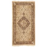 MACHINE KNOTTED RUG, 20TH CENTURY Caucasian design. Measures cm. 148 x 76. TAPPETO MECCANICO, XX